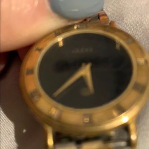 Gucci 2 toned watch silver and gold